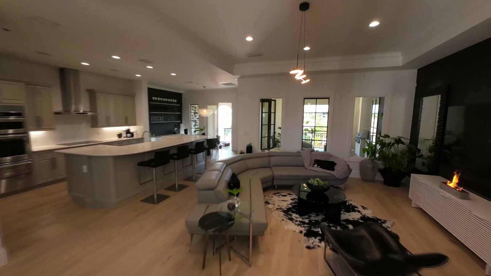 Open kitchen and great room with island seating
